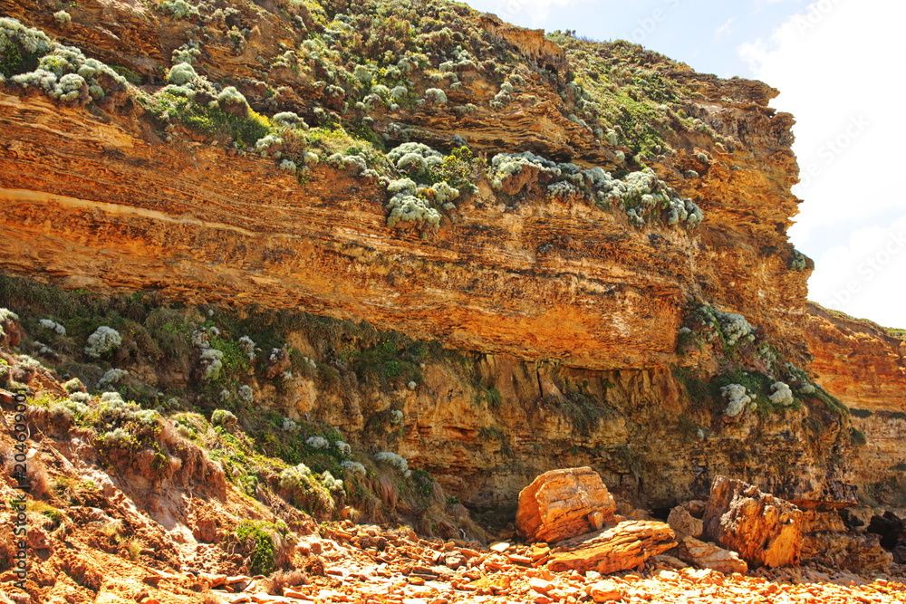 An outcrop in the Australian outback, detailing stratigraphic layers in the rock